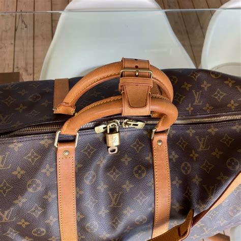 louis vuitton keepall authenticity|Louis Vuitton Keepall bandouliere.